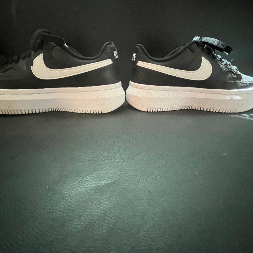 Nike platform black sneakers